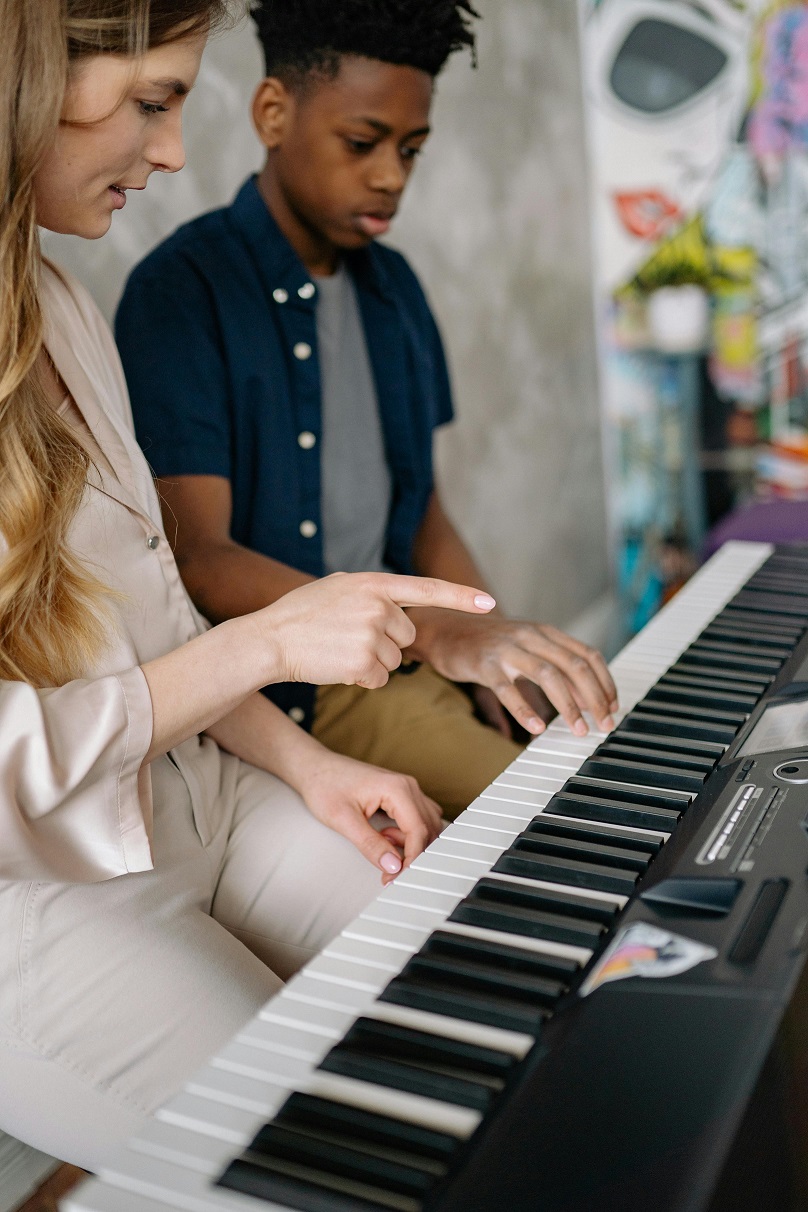 musician teacher with student